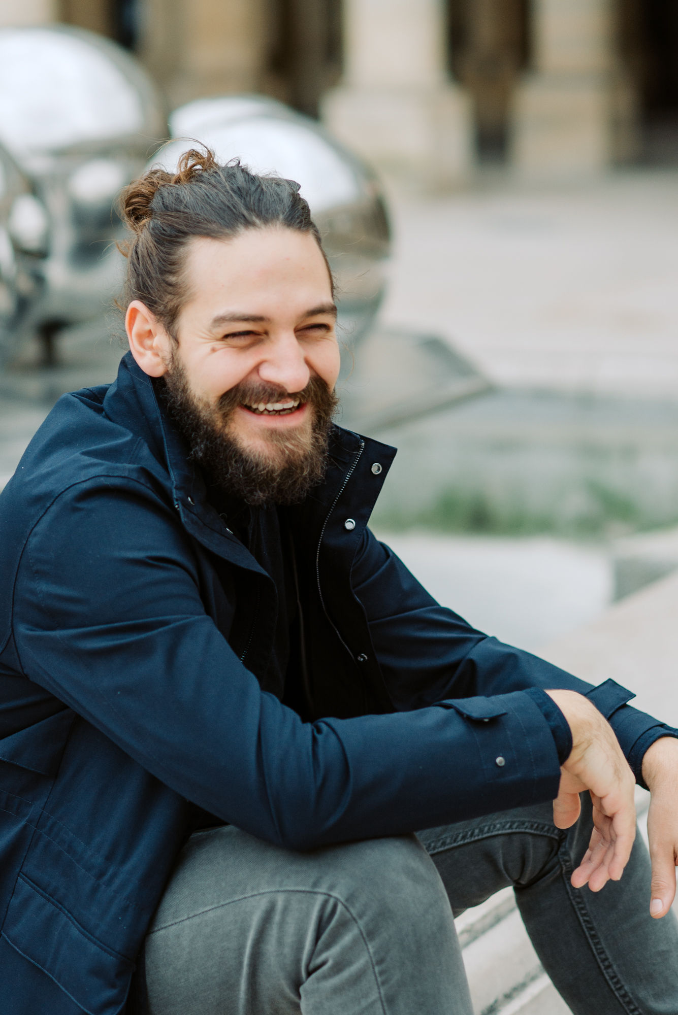 Tour guide smiling in a Paris square