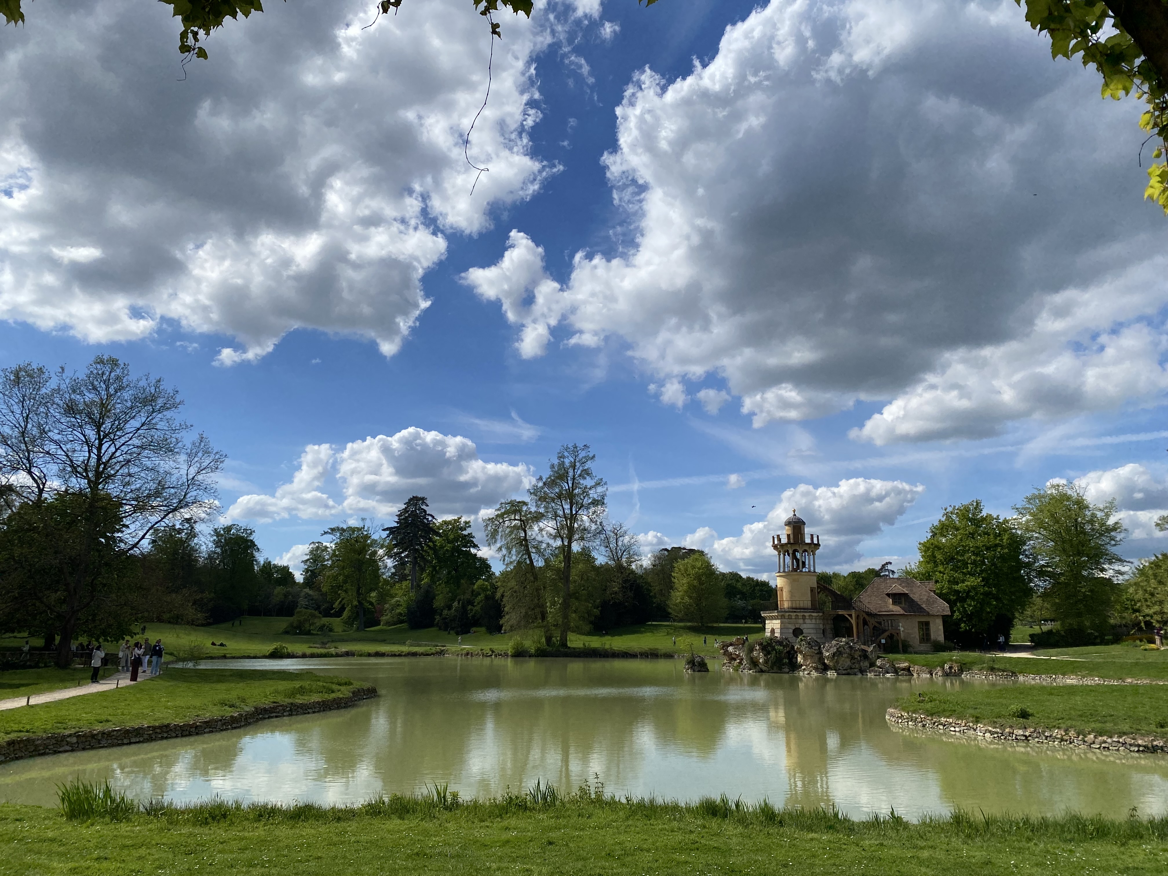 Scenic lake and temple-like pavilion in a Paris park